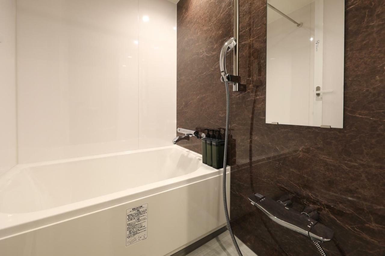 แกรนด์ เบส ฮากาตะซิตี้ Aparthotel ฟูกุโอกะ ภายนอก รูปภาพ