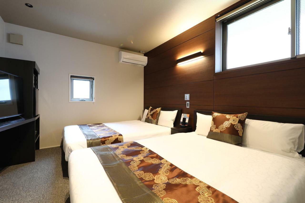 แกรนด์ เบส ฮากาตะซิตี้ Aparthotel ฟูกุโอกะ ภายนอก รูปภาพ