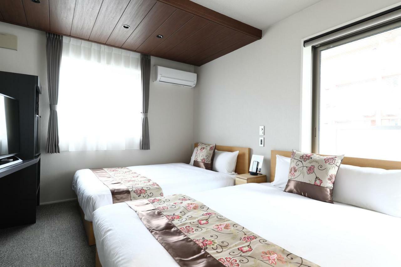 แกรนด์ เบส ฮากาตะซิตี้ Aparthotel ฟูกุโอกะ ภายนอก รูปภาพ